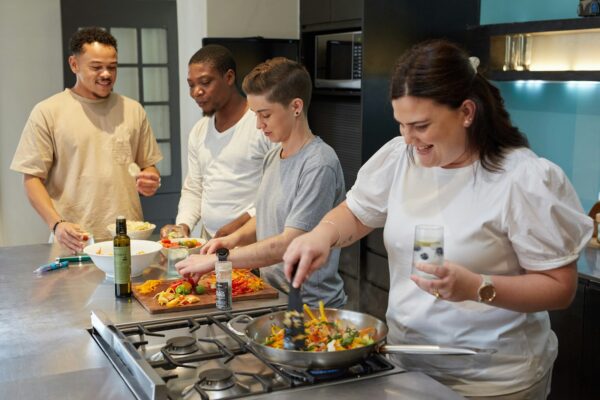 Friends preparing food together