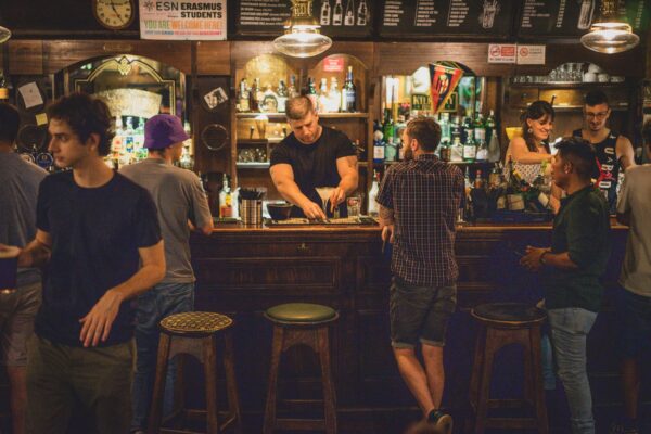 People enjoying drinks at a bar