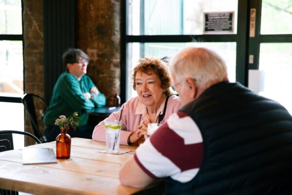 Friends chatting over tea